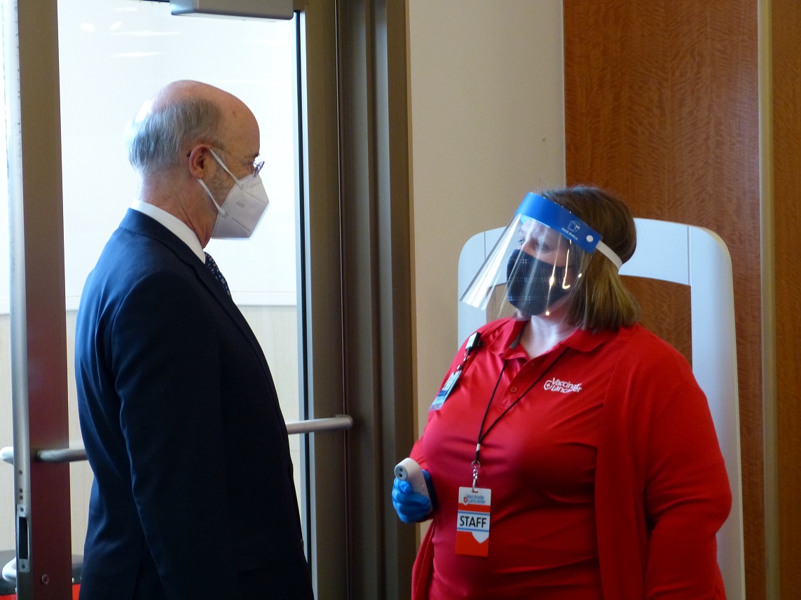 Gov. Tom Wolf answers questions during a temperature and symptom screening upon entering the Vaccinate Lancaster community vaccination center for a tour on Wednesday, March 10, 2021. (Photo: Tim Stuhldreher) 