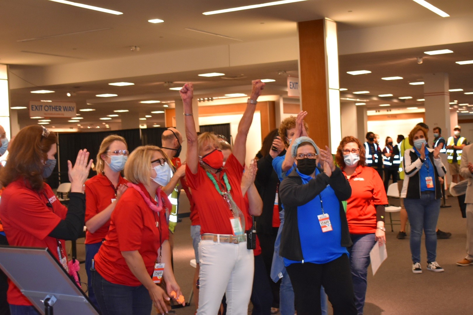 Staff cheer the final dose administered at the community vaccination center at Park City Center mall on Wednesday, June 30, 2021. (Source: Vaccinate Lancaster Coalition) 