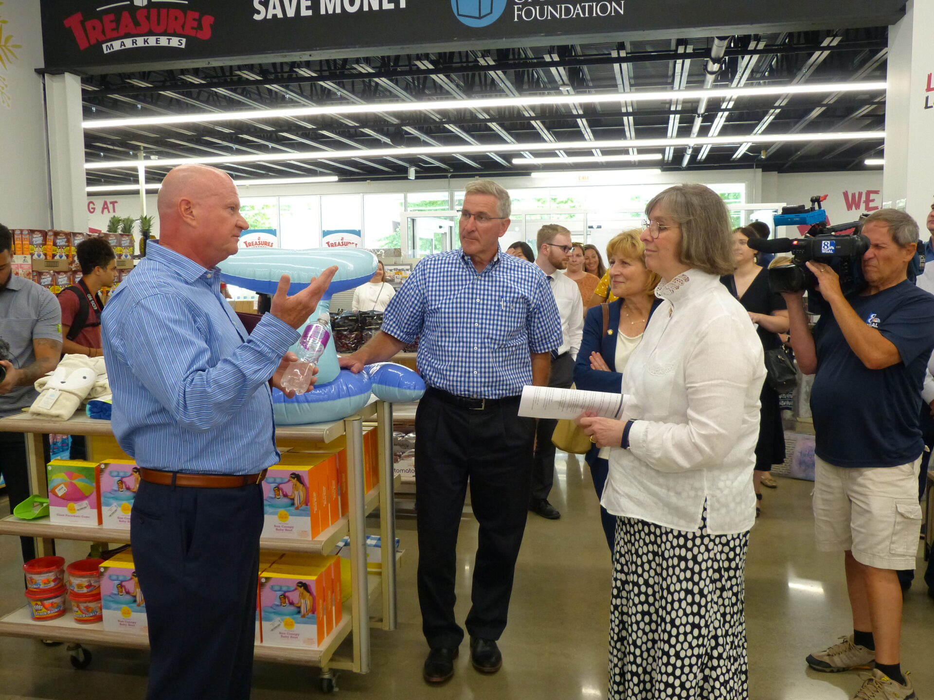 Treasures Markets founder, left, explains the history of the enterprise to, from left, Agriculture Secretary Russell Redding, state Sen. Judy Schwank and Pa. First Lady Frances Wolf during a tour on Monday, July 19, 2021. (Photo: Tim Stuhldreher) 