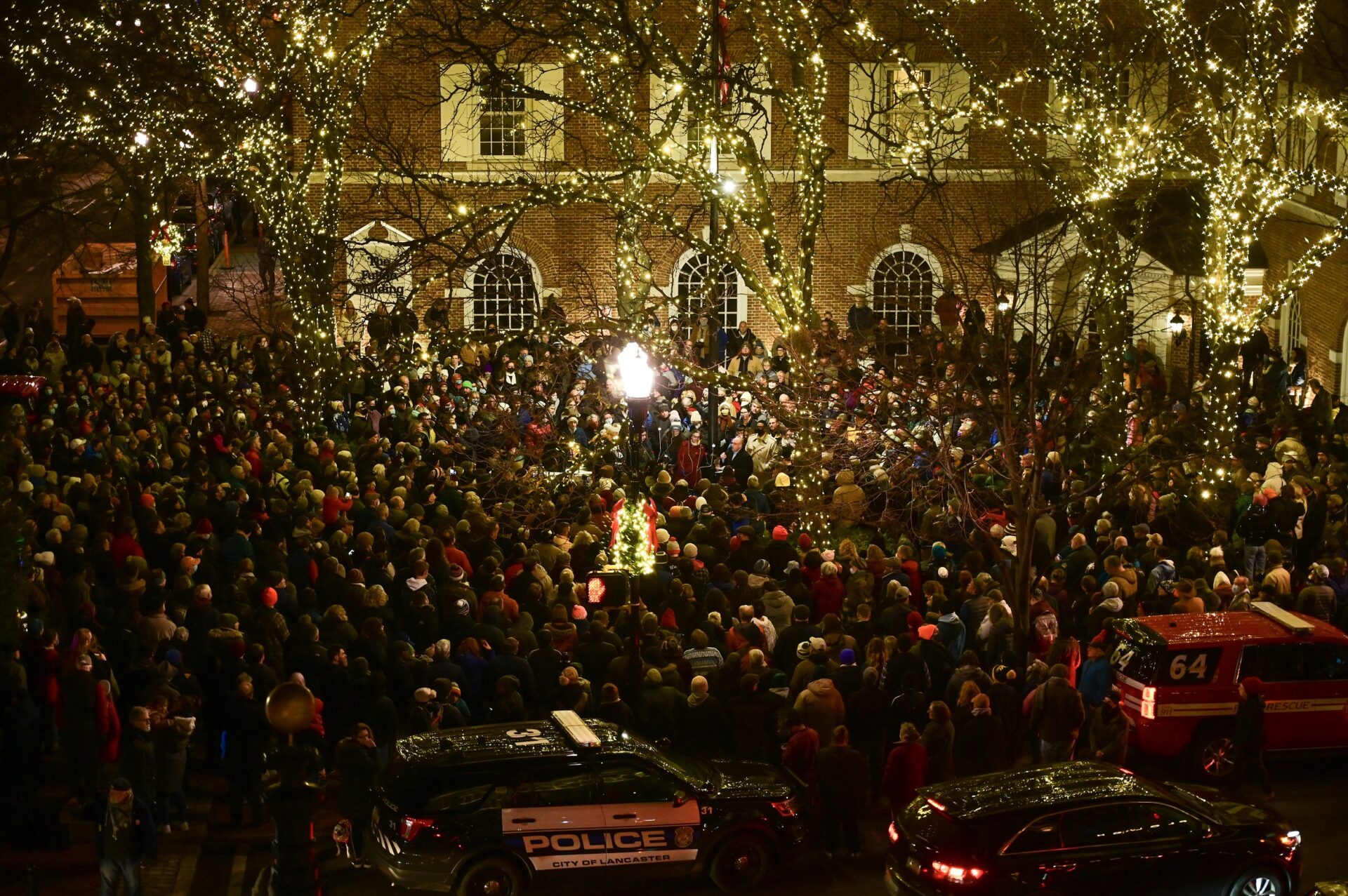 A crowd is gathered at Penn Square for a menorah lighting on Sunday, Nov. 28, 2021. (Photo: Kevin Ressler) 