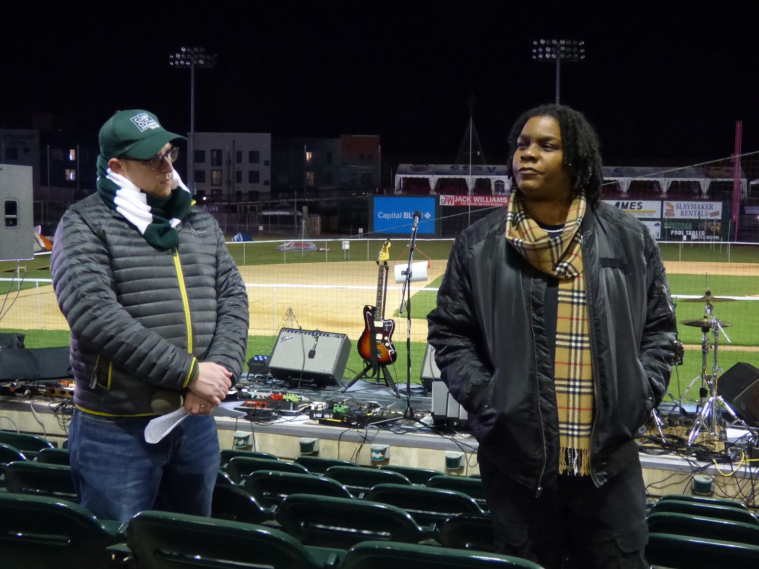 As Tenfold CEO MIke McKenna looks on, Julez Butler talks about homelessness to participants at the Camp Out for Homelessness to Housing. (Photo: Tim Stuhldreher) 