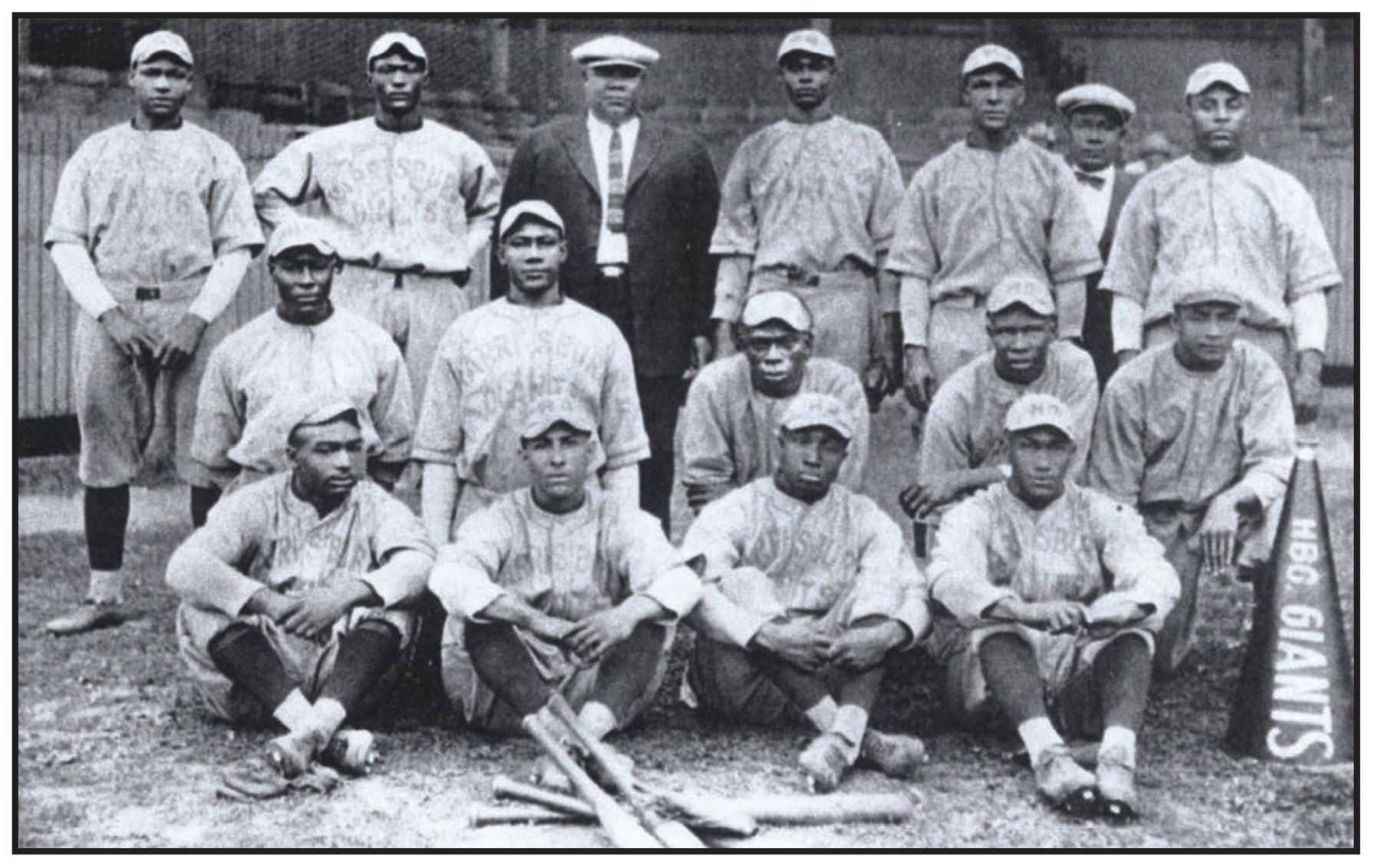 The 1924 Harrisburg Giants. Back row, left to right: Unknown, Herbert “Rap” Dixon, Colonel “C.W.” Strothers, Unknown, Unknown, Unknown, Oscar Charleston. 
Middle row, left to right: Kenneth “Ping” Gardner, Edgar Wesley, Unknown, Unknown, Unknown. Front row, left to right: Daltie Cooper, Clarence “Fats” Jenkins, Unknown, Unknown. (Source: Center for Negro Baseball League Research) 