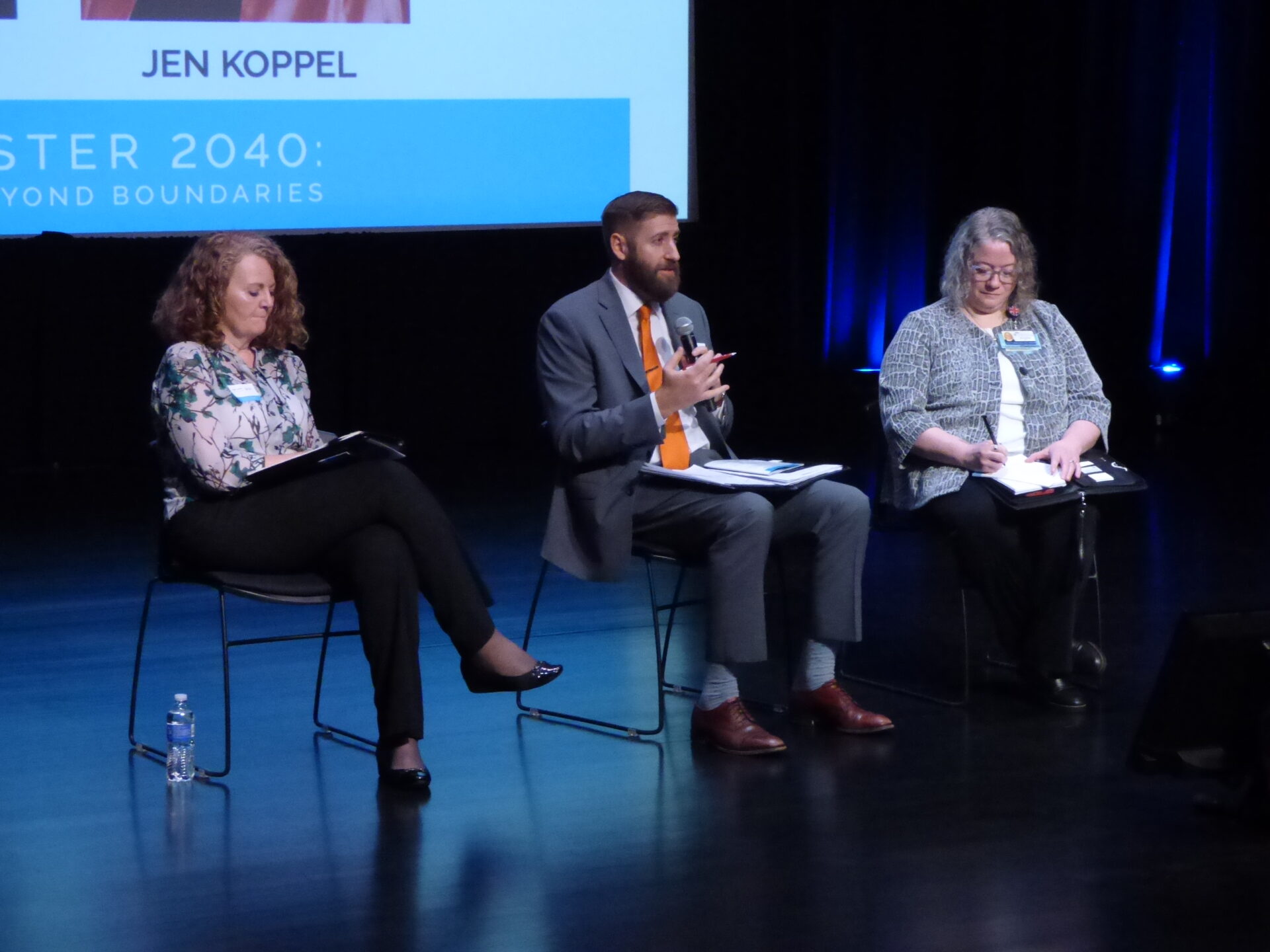 Jen Koppel, right, former director of Lanc Co MyHome, the county homelessness coalition; and Ethan Demme, East Lampeter Township Supervisor, discuss zoning and regulation. At left is moderator Angela Cuthbert of Millersville University.