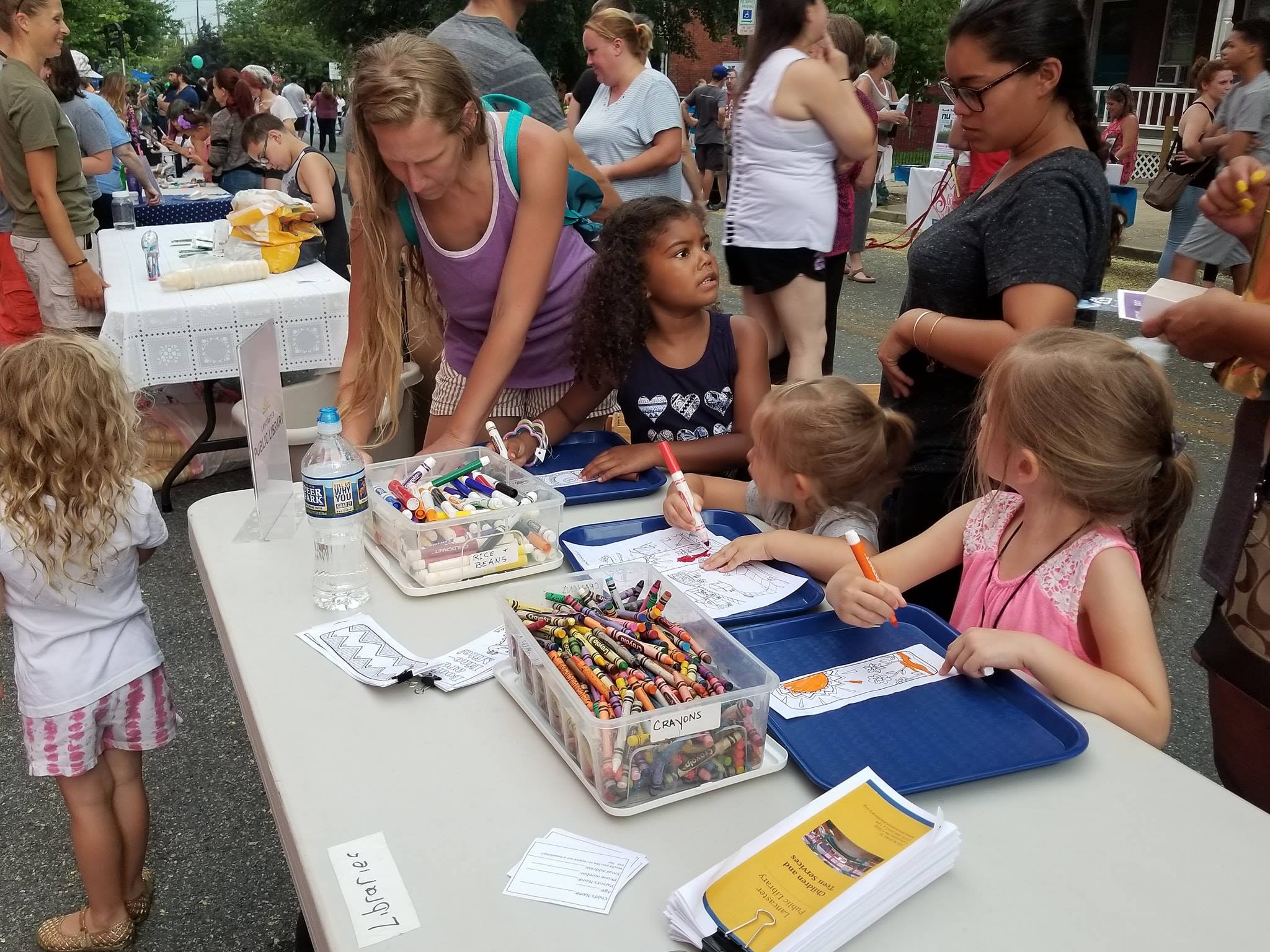 Children enjoy coloring during a block party in northeast Lancaster in 2018. (Source: Northeast Neighbors United)