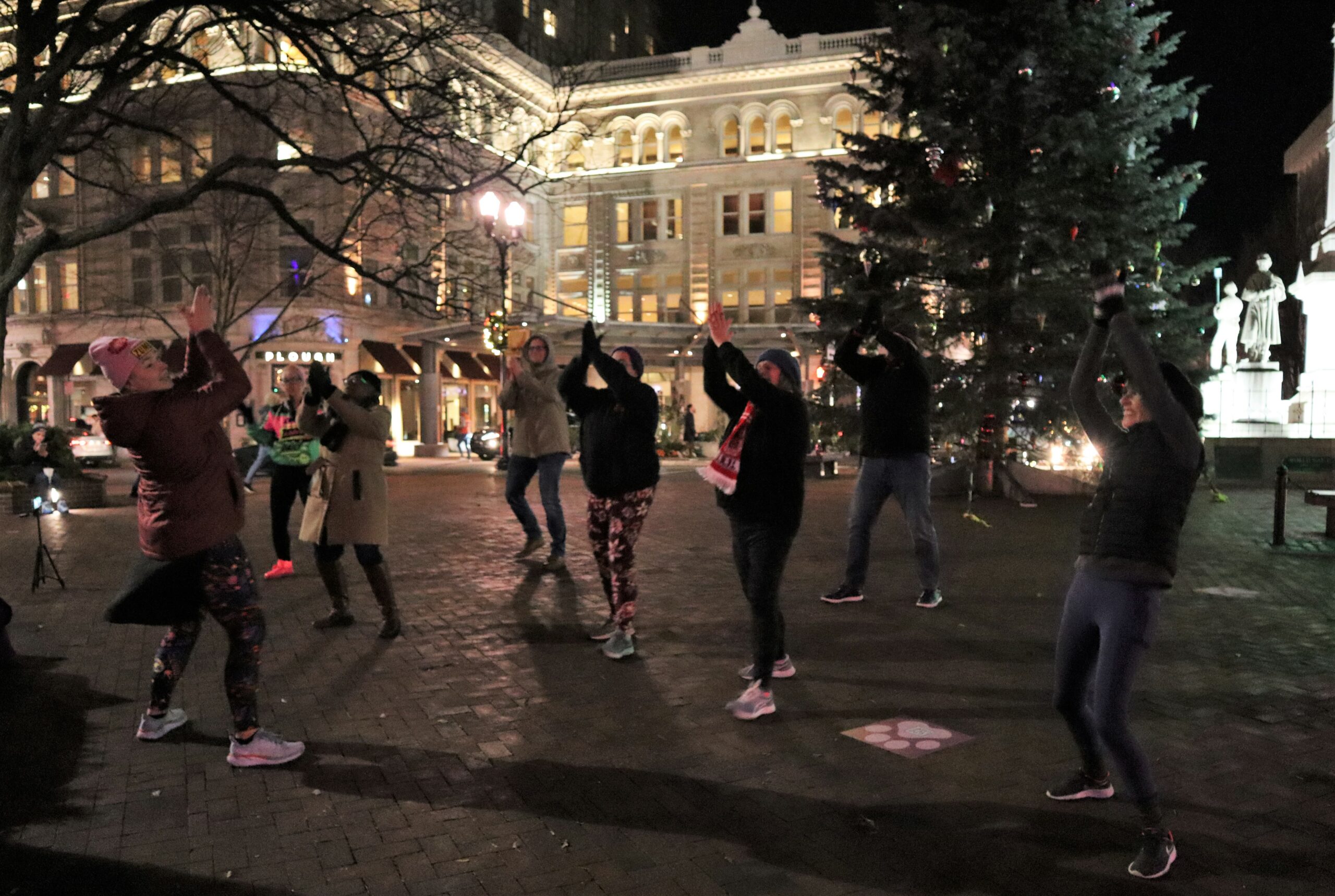 YMCA of the Roses instructor Amanda Klotz, left, leads a Zumba class in Penn Square for ExtraGive. 