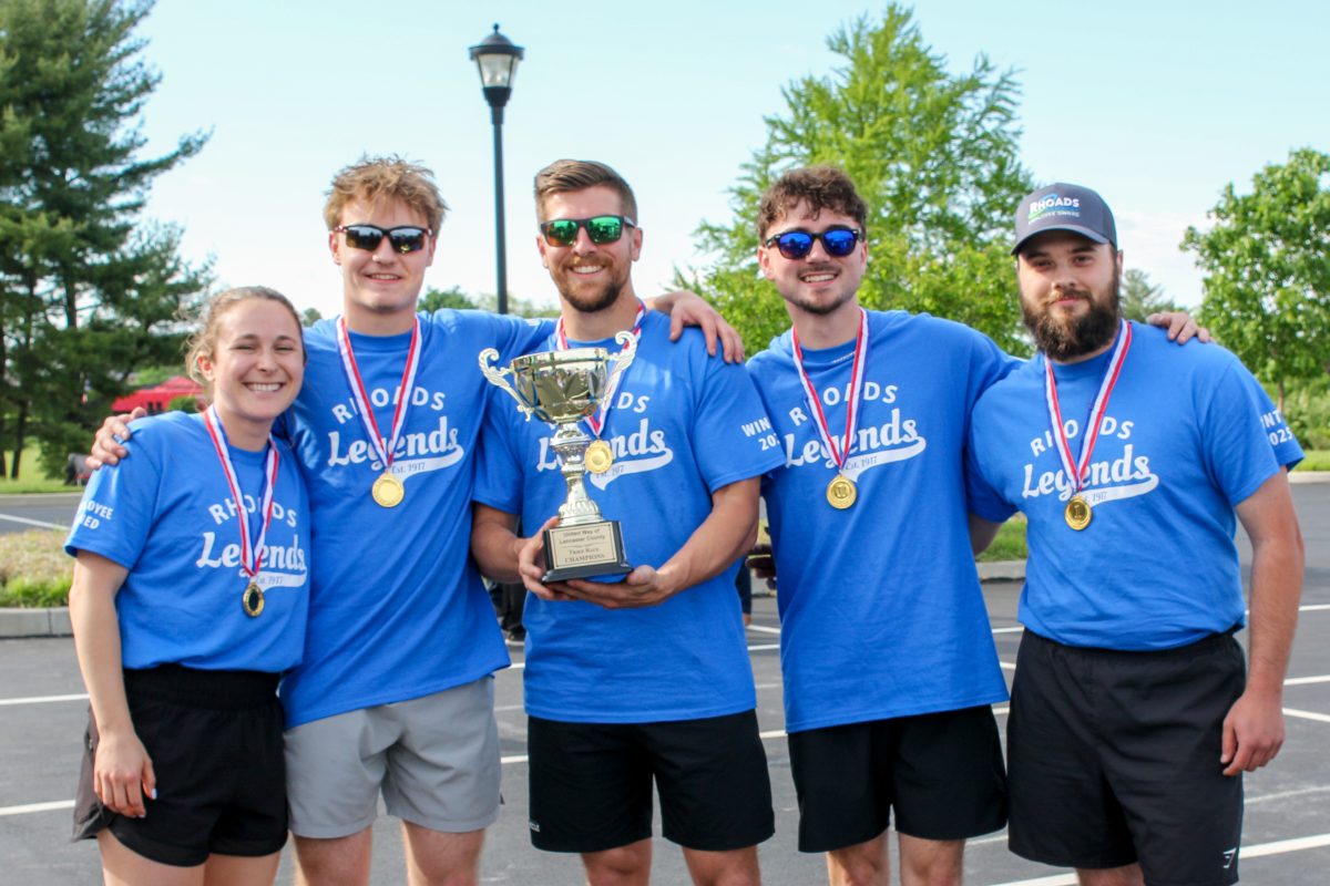 Trophy Roahds Rhoads Energy Corporation team poses with the trike trophy (Photo: Daphnee McMaster)