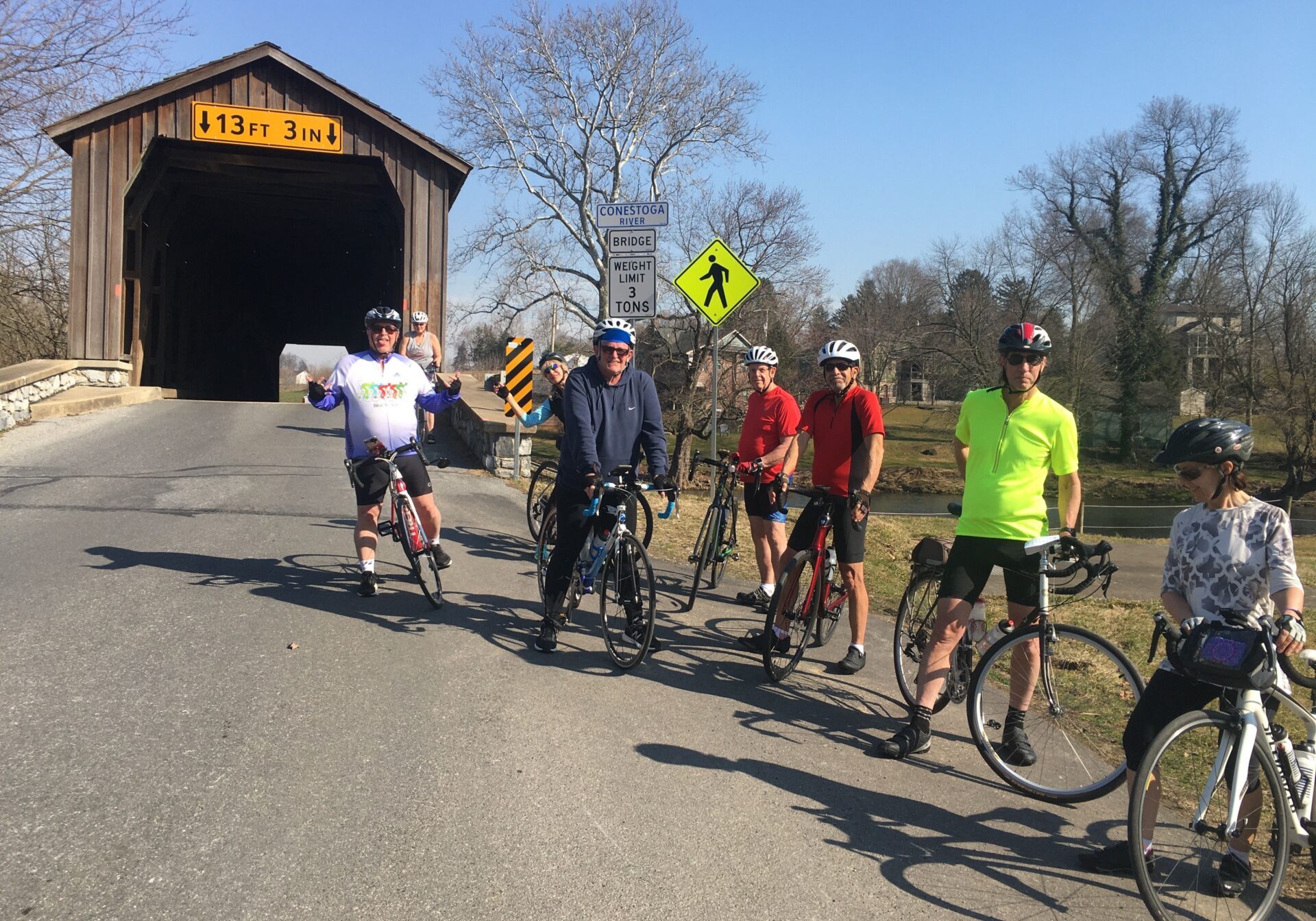Bike 4 - Hunsecker's Mill Covered Bridge Members of the Lancaster Bicycle Club pause for a photo by the Hunsecker's Mill Bridge during a ride. (Source: Provided)