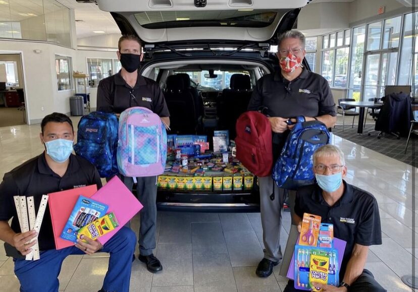 CrossNet buddy bags CrossNet volunteers from New Holland Motor Group helping with a backpack drive. (Source: Meredith Dahl)