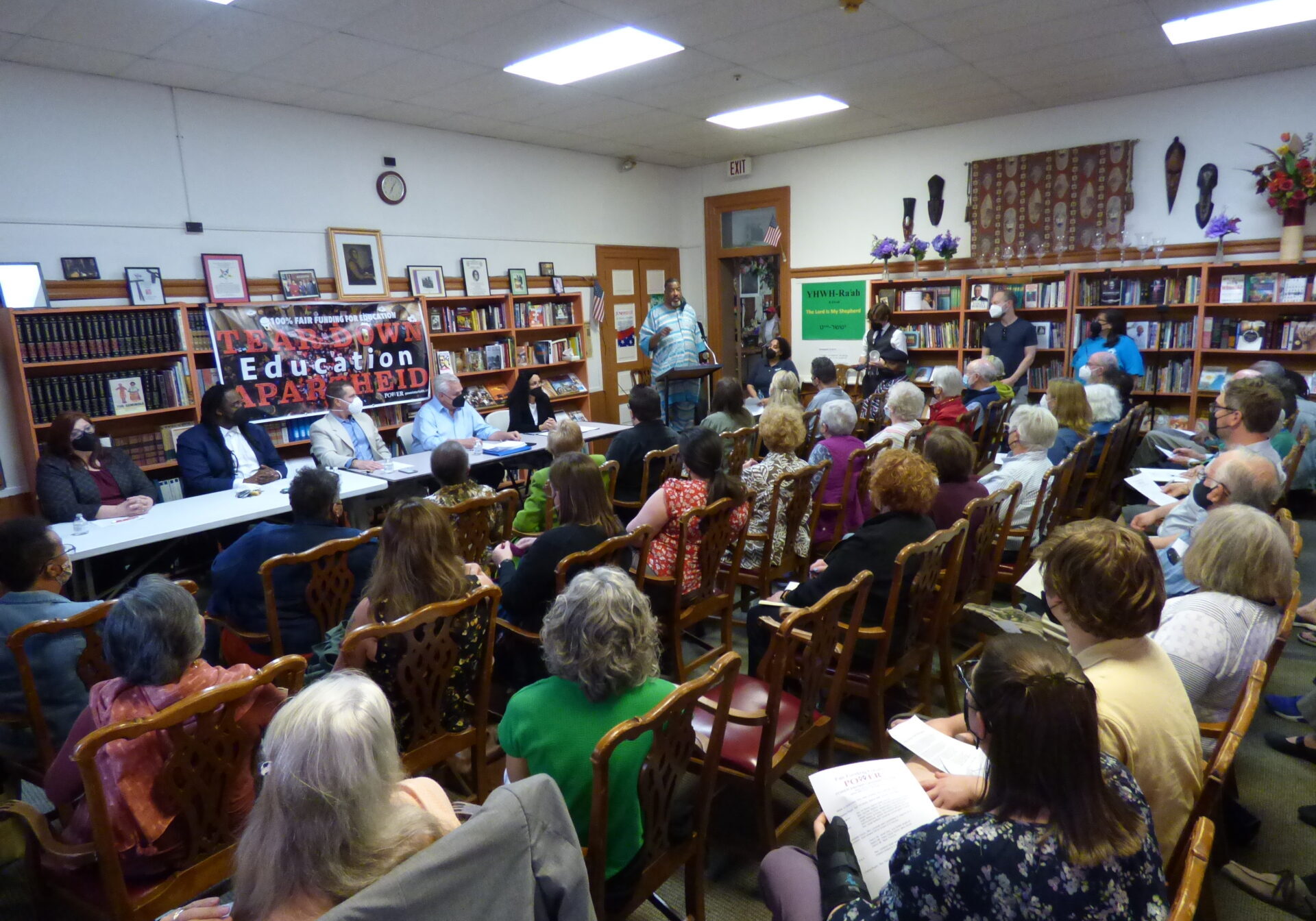 Fair Funding The Rev. Edward Bailey, in center at podium, welcomes the audience to Power Interfaith's forum on education fair funding, held at Bethel AME Church's Cultural Center on Tuesday, May 3, 2022. (Photo: Tim Stuhldreher)