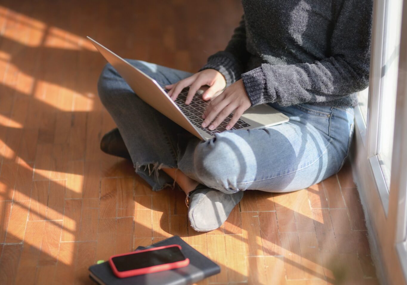woman on floor using laptop woman on floor using laptop